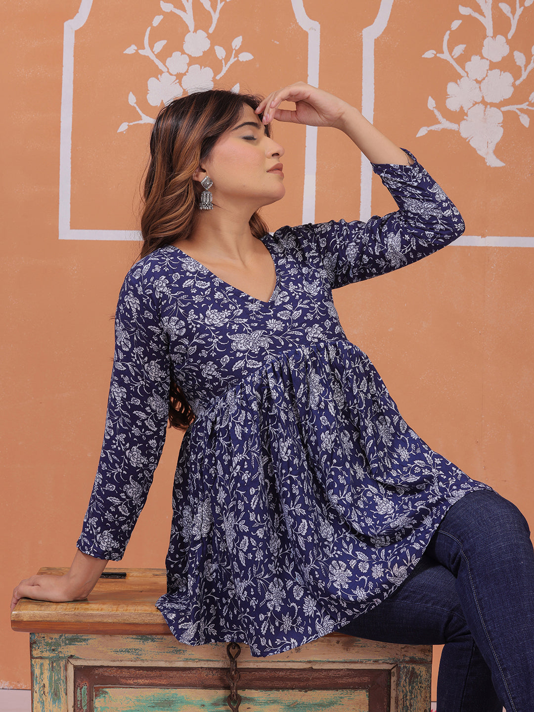 Mitrika navy blue floral printed V-neck flared top