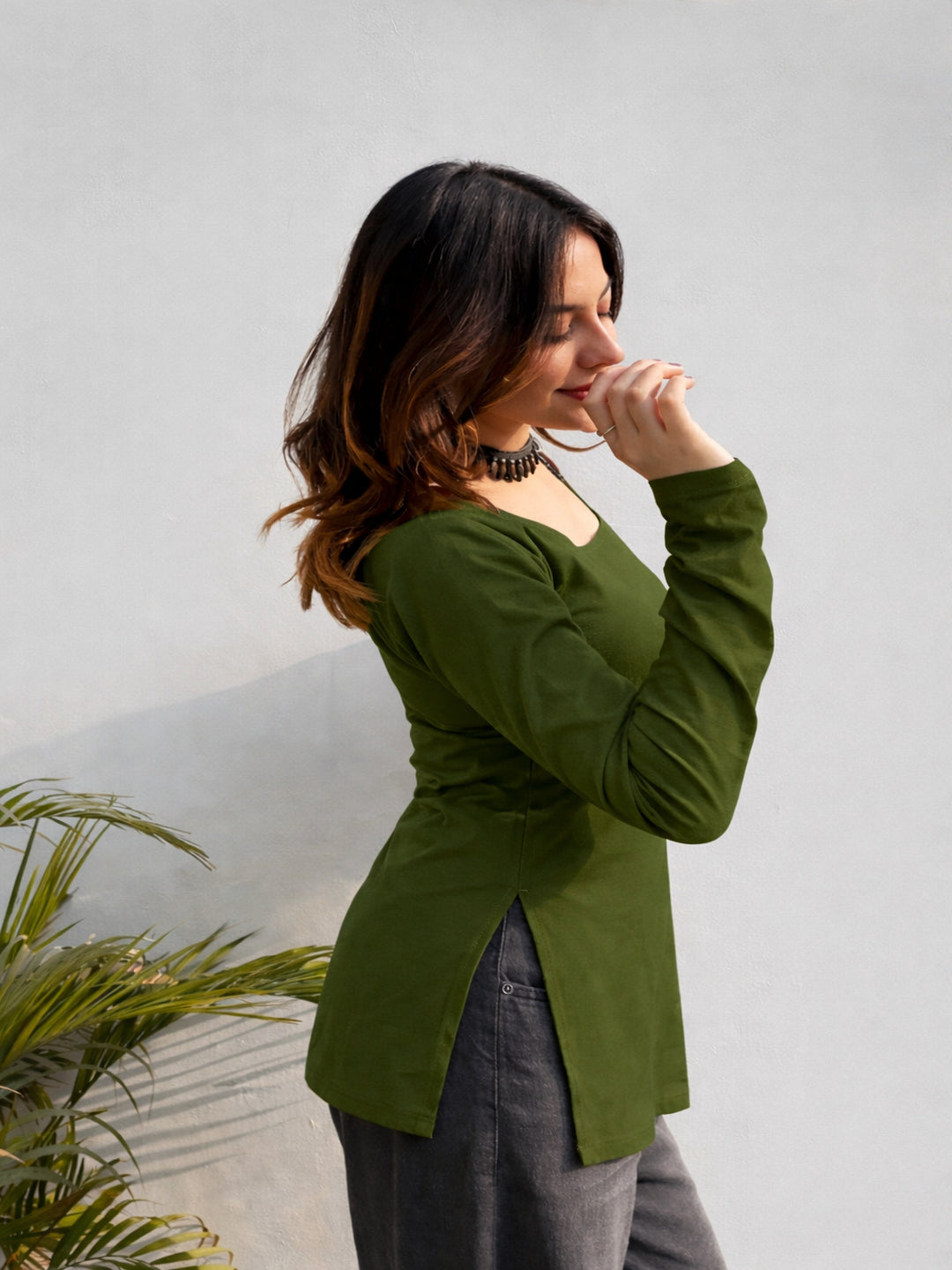 Women’s solid green cotton kurti with square neckline and full sleeves