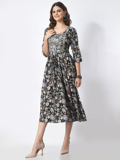 Woman wearing a floral dress on a white background
