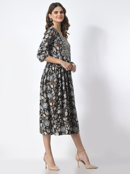 Woman wearing a floral dress on a white background