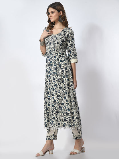 Woman wearing a floral kurta with white background