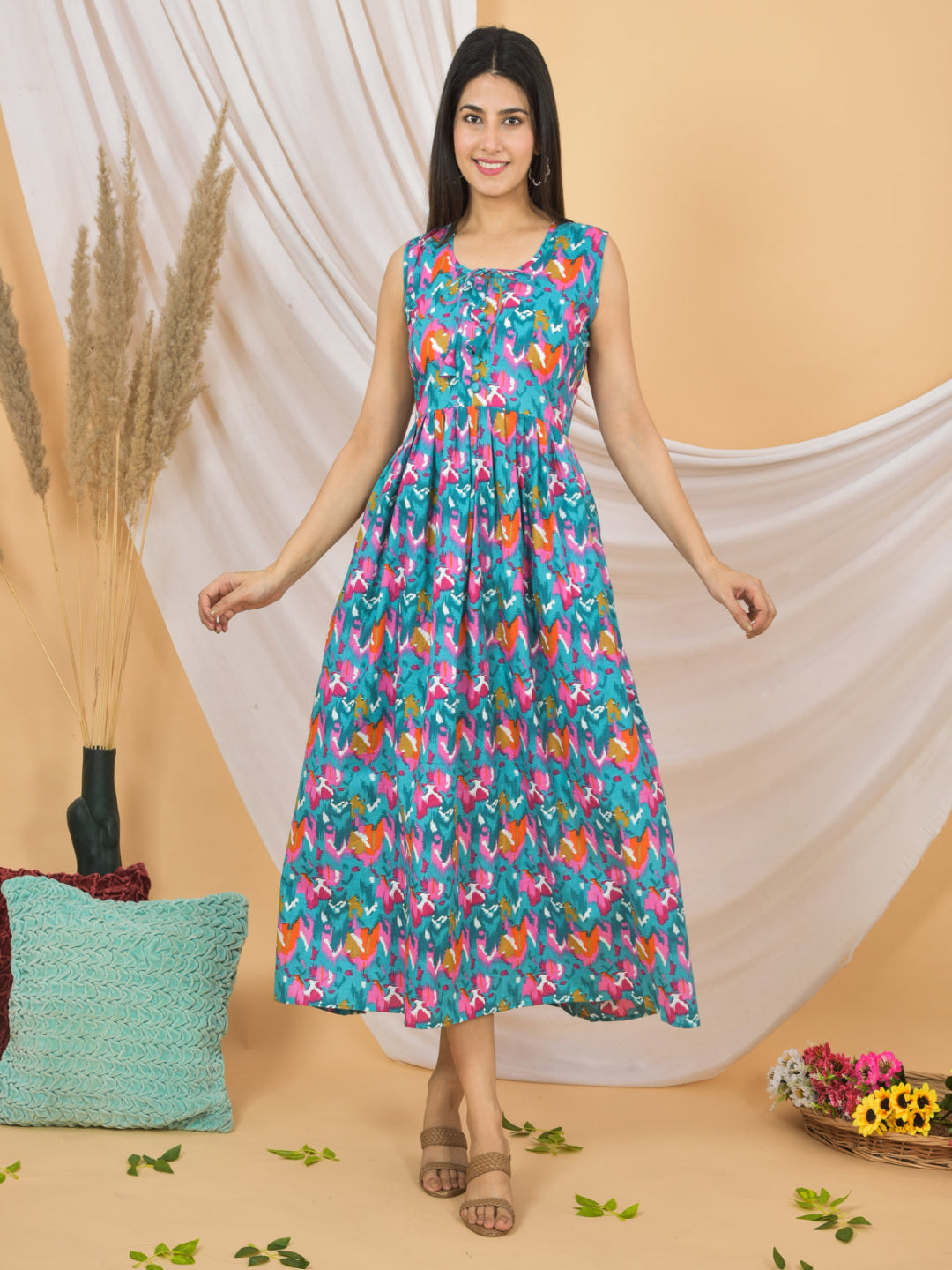 Woman wearing a colorful floral dress against a beige background