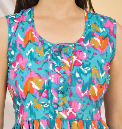 Multicolored sleeveless dress with abstract pattern on a neutral background
