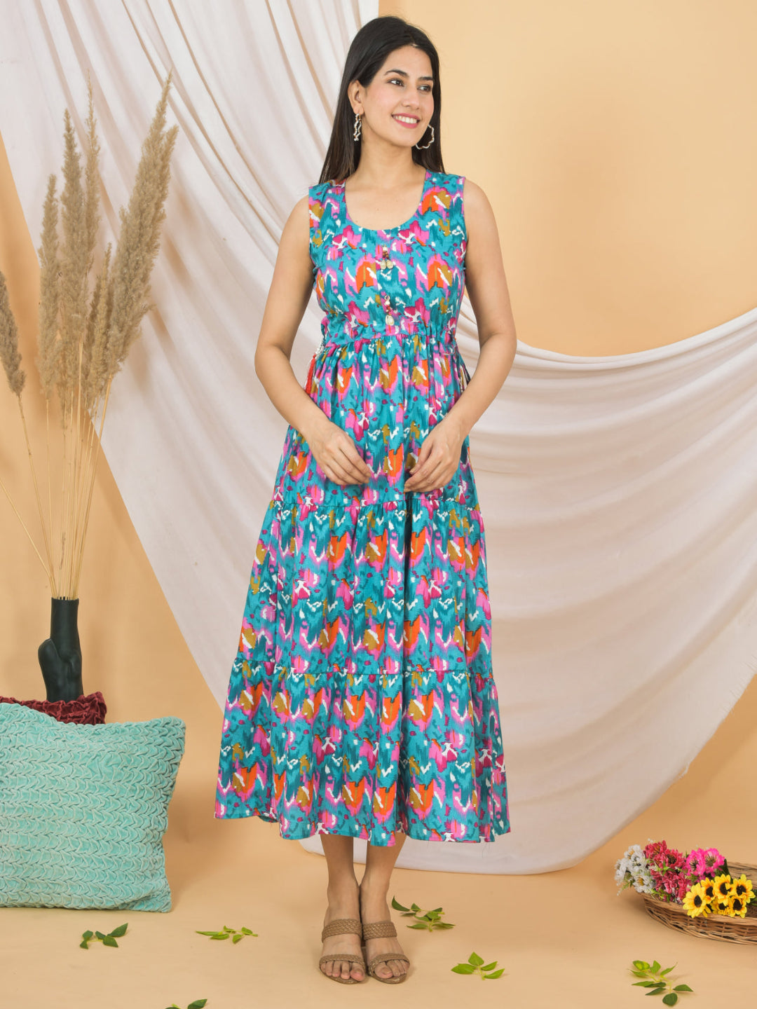 Woman wearing a colorful floral dress against a beige background