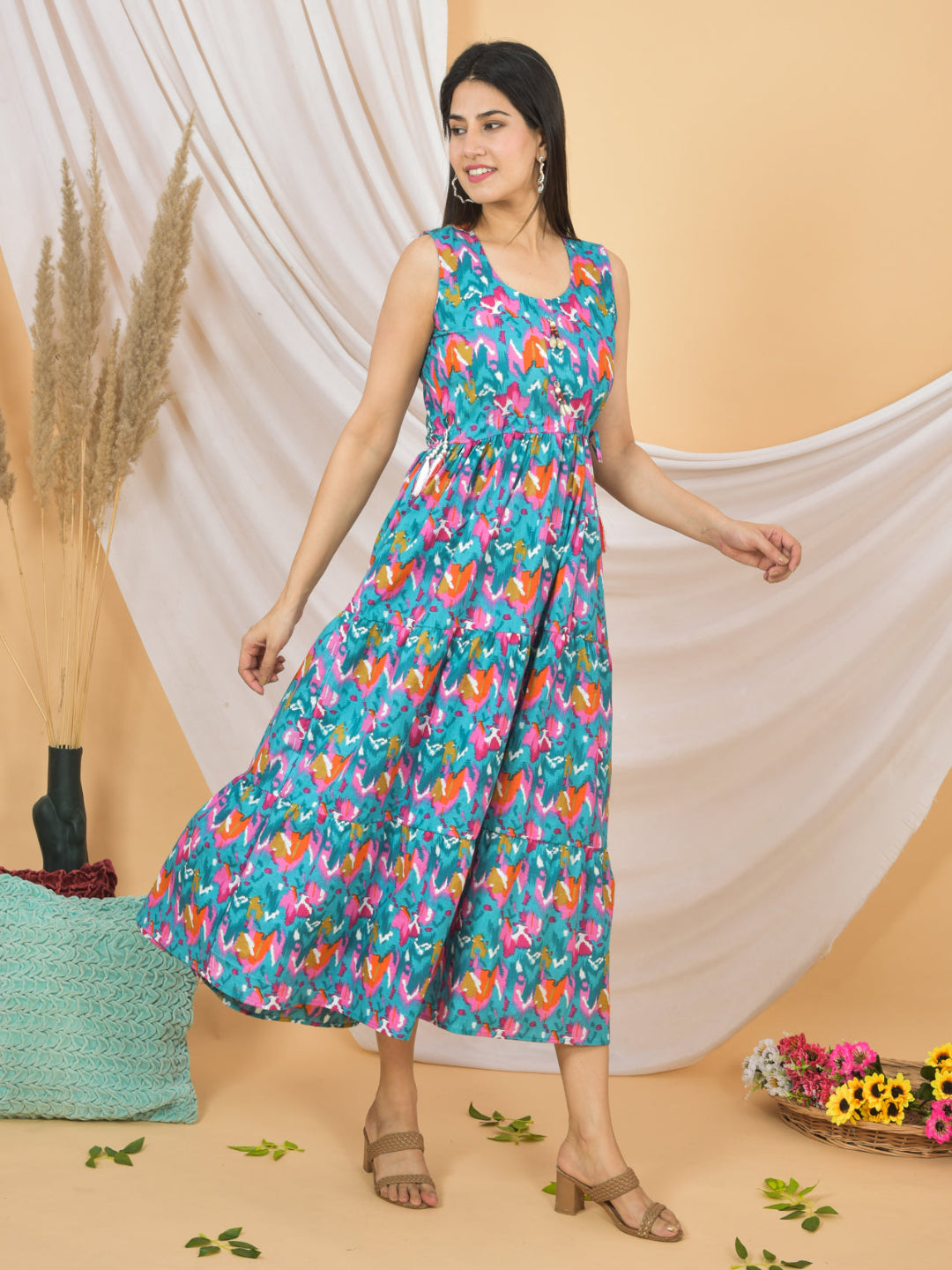 Woman wearing a colorful floral dress against a beige background