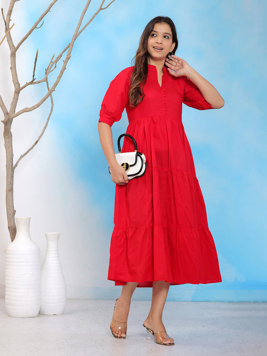 Red solid midi dress, tiered midi dress, puff sleeve dress, button down A-line dress, plain red summer dress, party wear midi dress, casual solid dress for women, lightweight cotton dress, elegant red dress, festive midi dress, bright red outfit, 3/4 sleeve dress, flowy red dress, women’s solid A-line dress, statement color dress. Mitrika