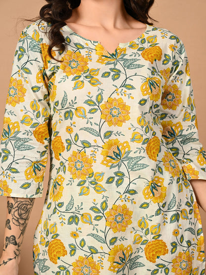 Floral patterned top with yellow flowers on a beige background